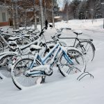 Snow covered bikes