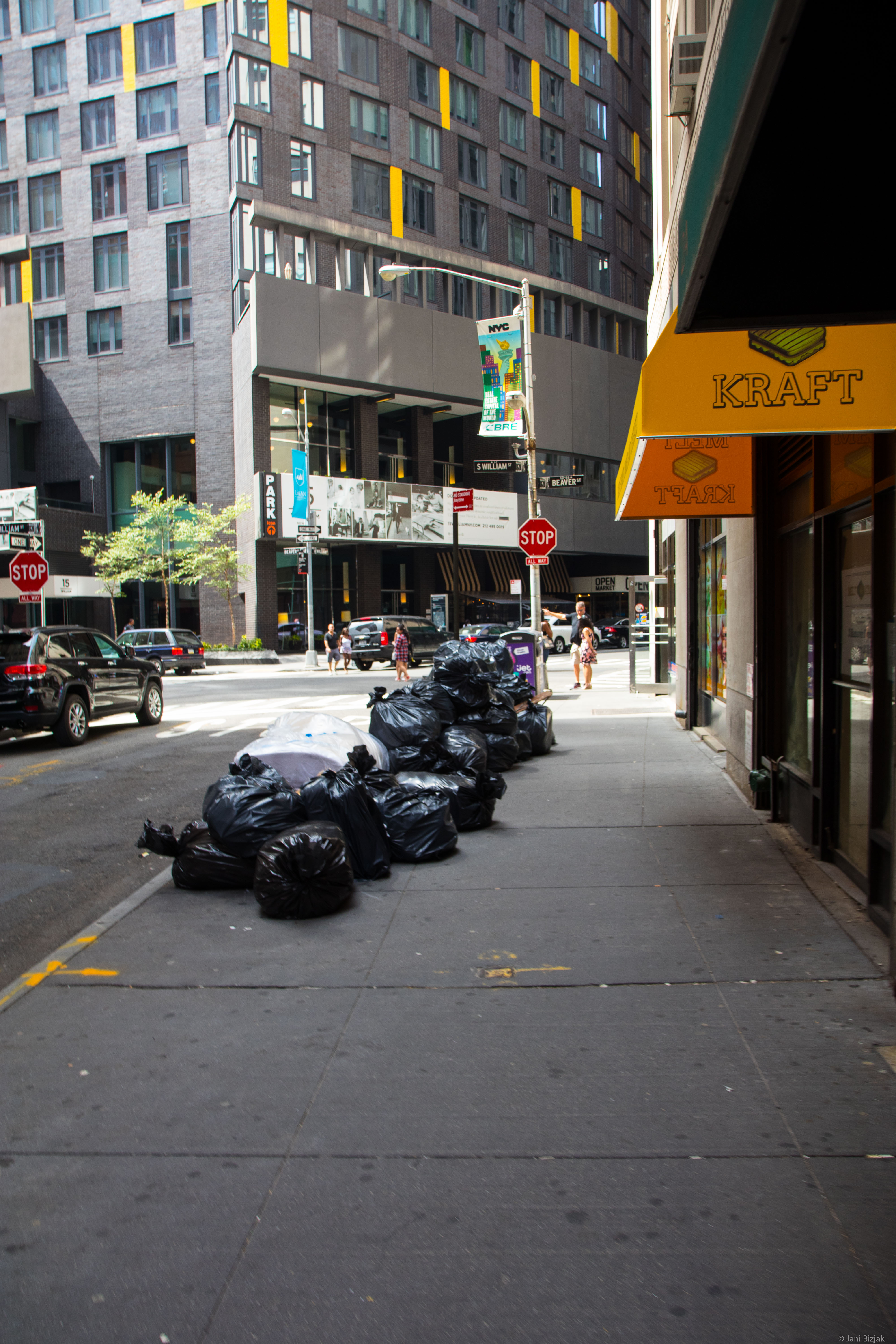 Trash bags in the middle of the street