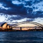Sydney opera and Harbour bridge at dusk.