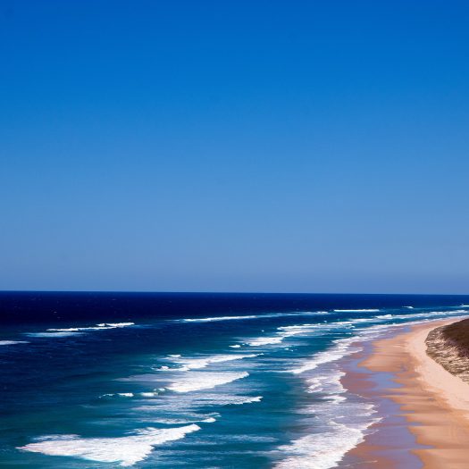 Sandy beach that stretches all around the island