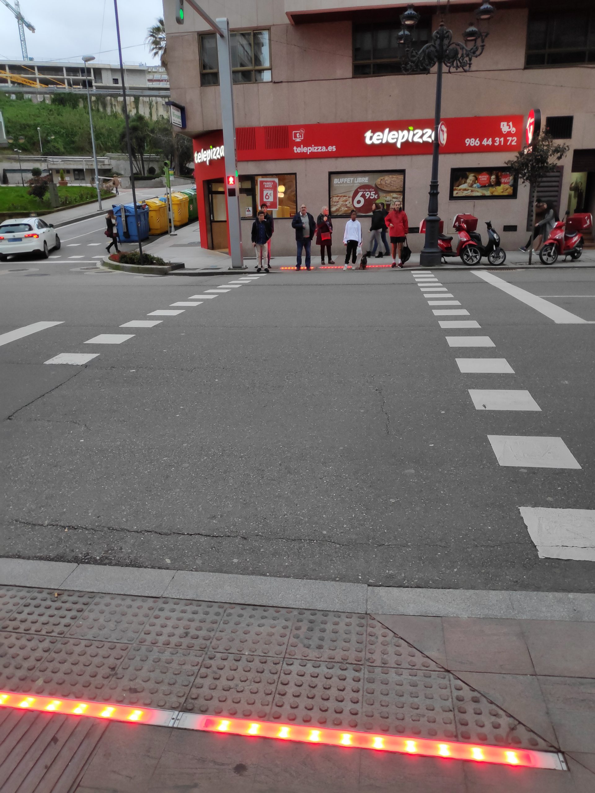 Lights integrated into the pavement turned red or green depending on the traffic light.