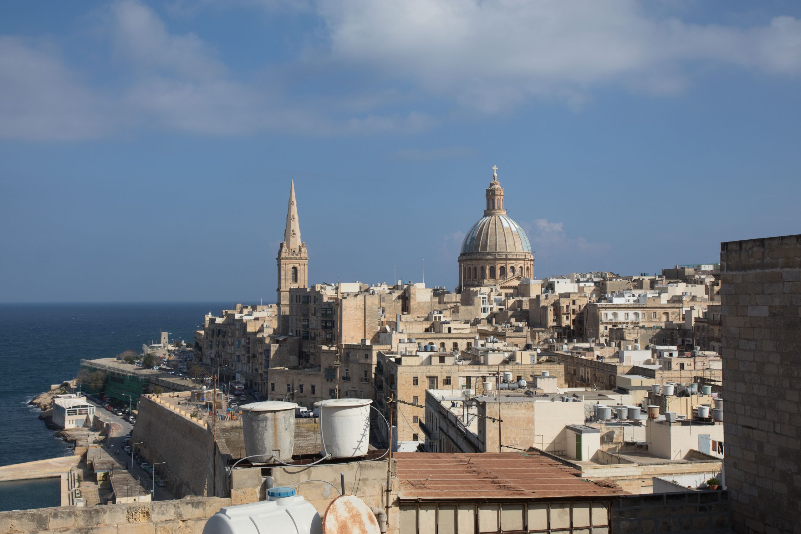 Enormous cathedrals rise above the roofs of Valletta.